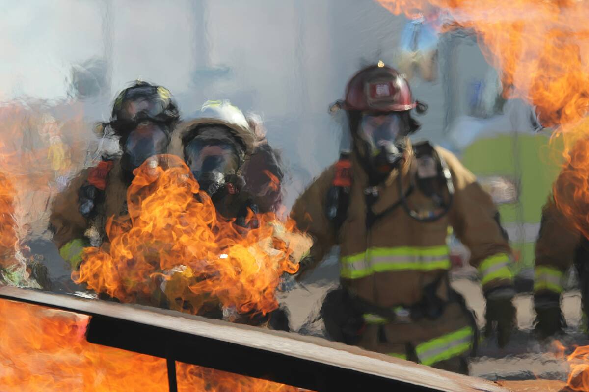 Firefighters near a fire