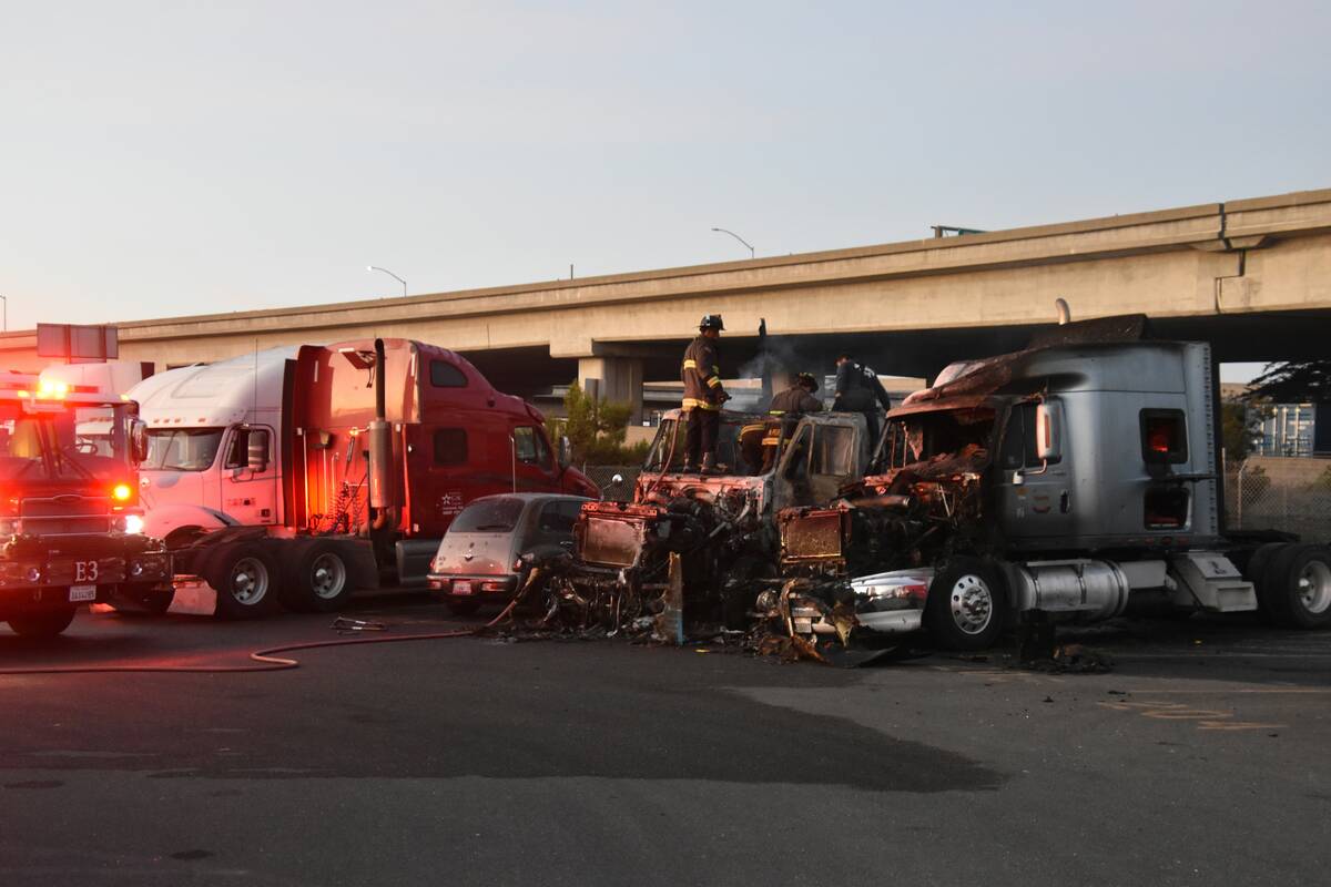 Semi trucks at a crash scene