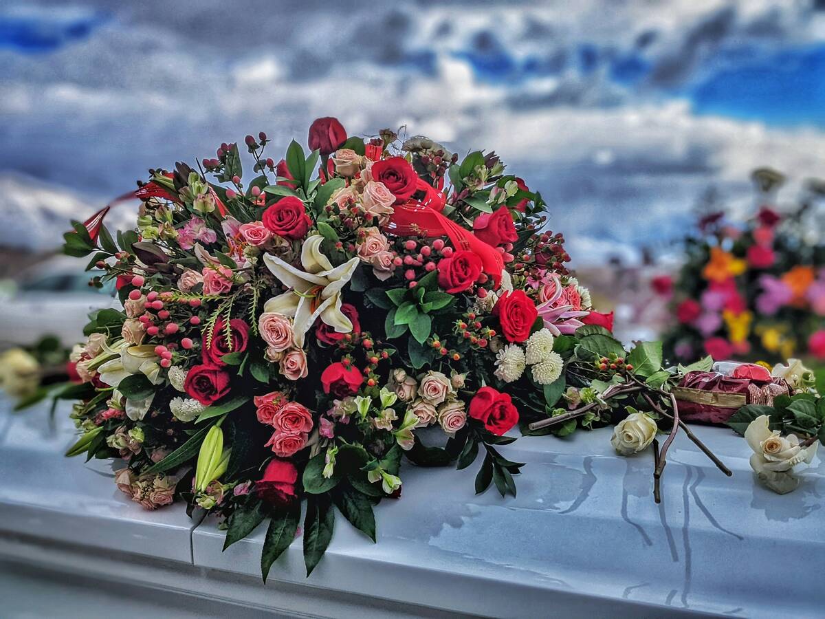Flowers placed on top of a car